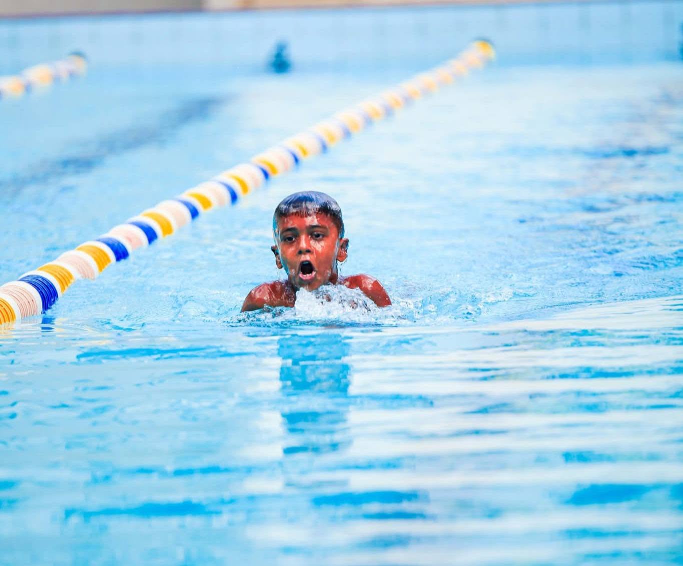 Young Benedictine Swimmer Sets Cholan World Record in 50m Breaststroke